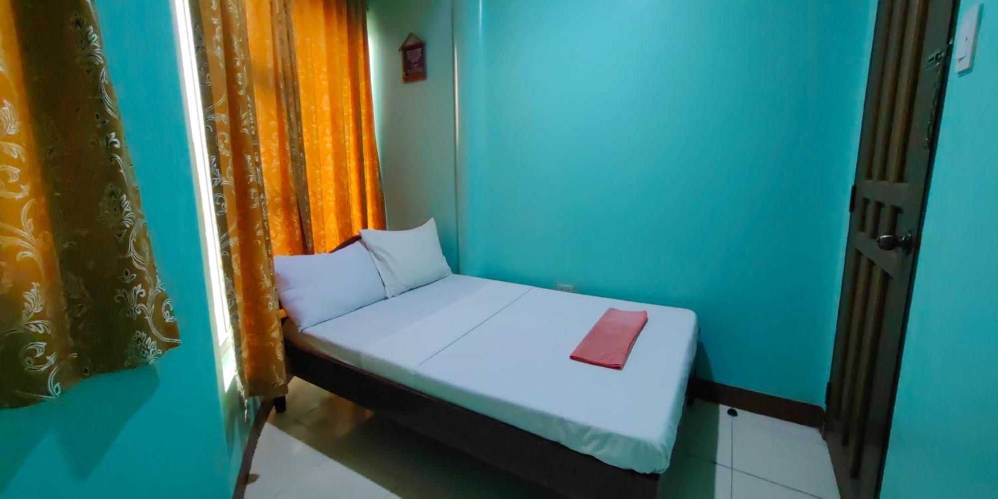 โอโย 554 แดดส์ เบย์วิว เพนชั่น Bed & Breakfast Puerto Princesa ภายนอก รูปภาพ