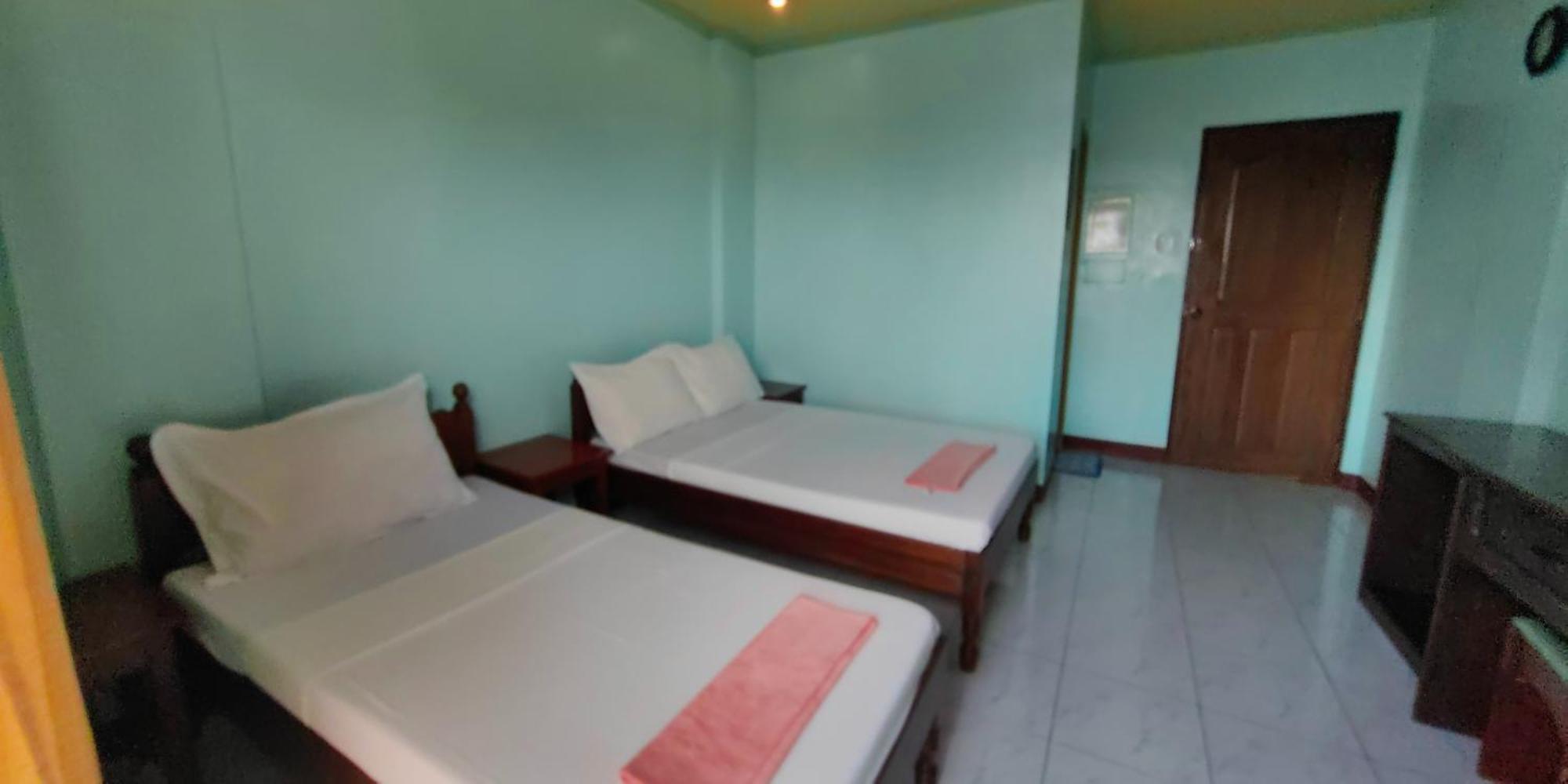 โอโย 554 แดดส์ เบย์วิว เพนชั่น Bed & Breakfast Puerto Princesa ภายนอก รูปภาพ