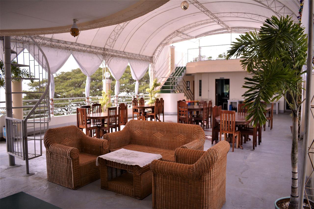 โอโย 554 แดดส์ เบย์วิว เพนชั่น Bed & Breakfast Puerto Princesa ภายนอก รูปภาพ