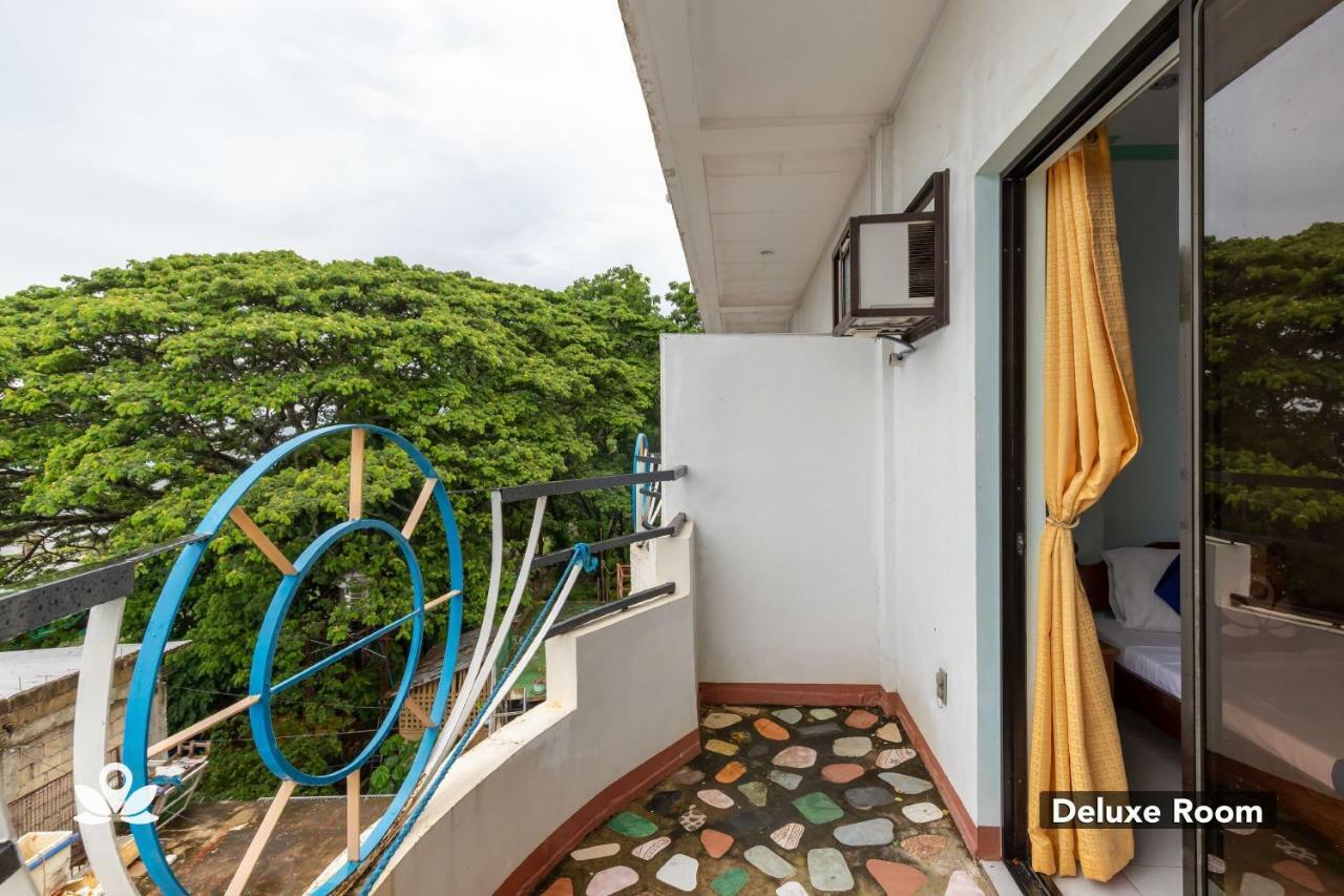 โอโย 554 แดดส์ เบย์วิว เพนชั่น Bed & Breakfast Puerto Princesa ภายนอก รูปภาพ
